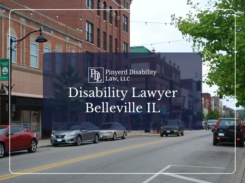 Downtown Belleville, Illinois street with the Pinyerd Disability Law logo and the words Disability Lawyer Belleville IL